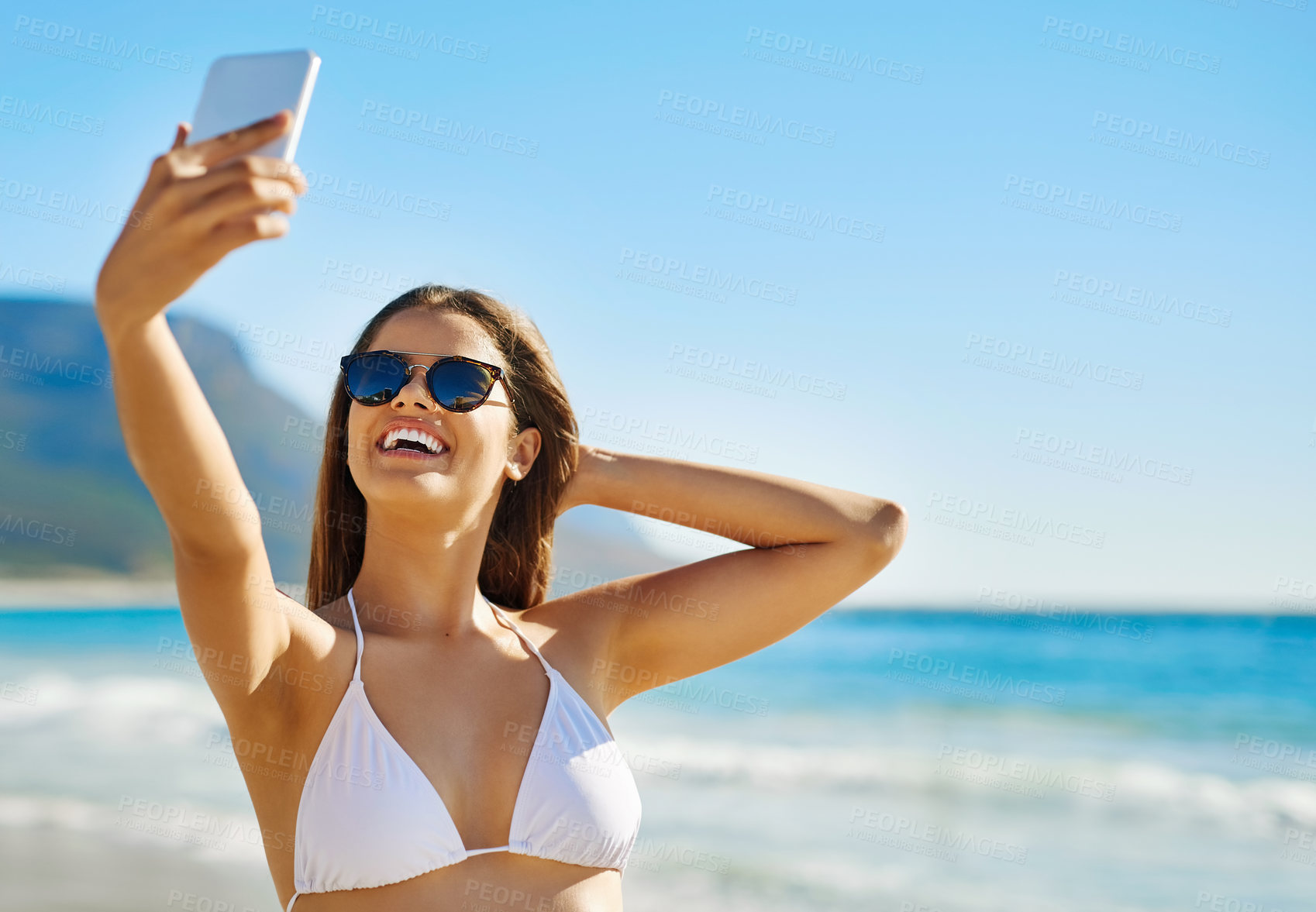 Buy stock photo Selfie, sunglasses and woman by beach for travel, holiday or getaway for vacation blog post. Happy, seaside and female person with photography picture for memory by ocean for tropical weekend trip.