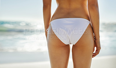 Buy stock photo Rearview shot of an unrecognizable person posing in her bikini bottom