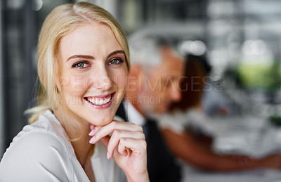 Buy stock photo Portrait of a businesswoman sitting in a boardroom meeting with colleagues blurred in the background