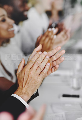 Buy stock photo Cropped shot of a group of businesspeople applauding a business presentation