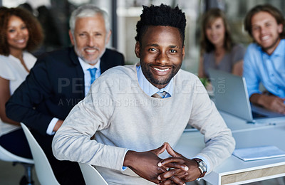 Buy stock photo Portrait of a team of professionals having a meeting in the boardroom at work