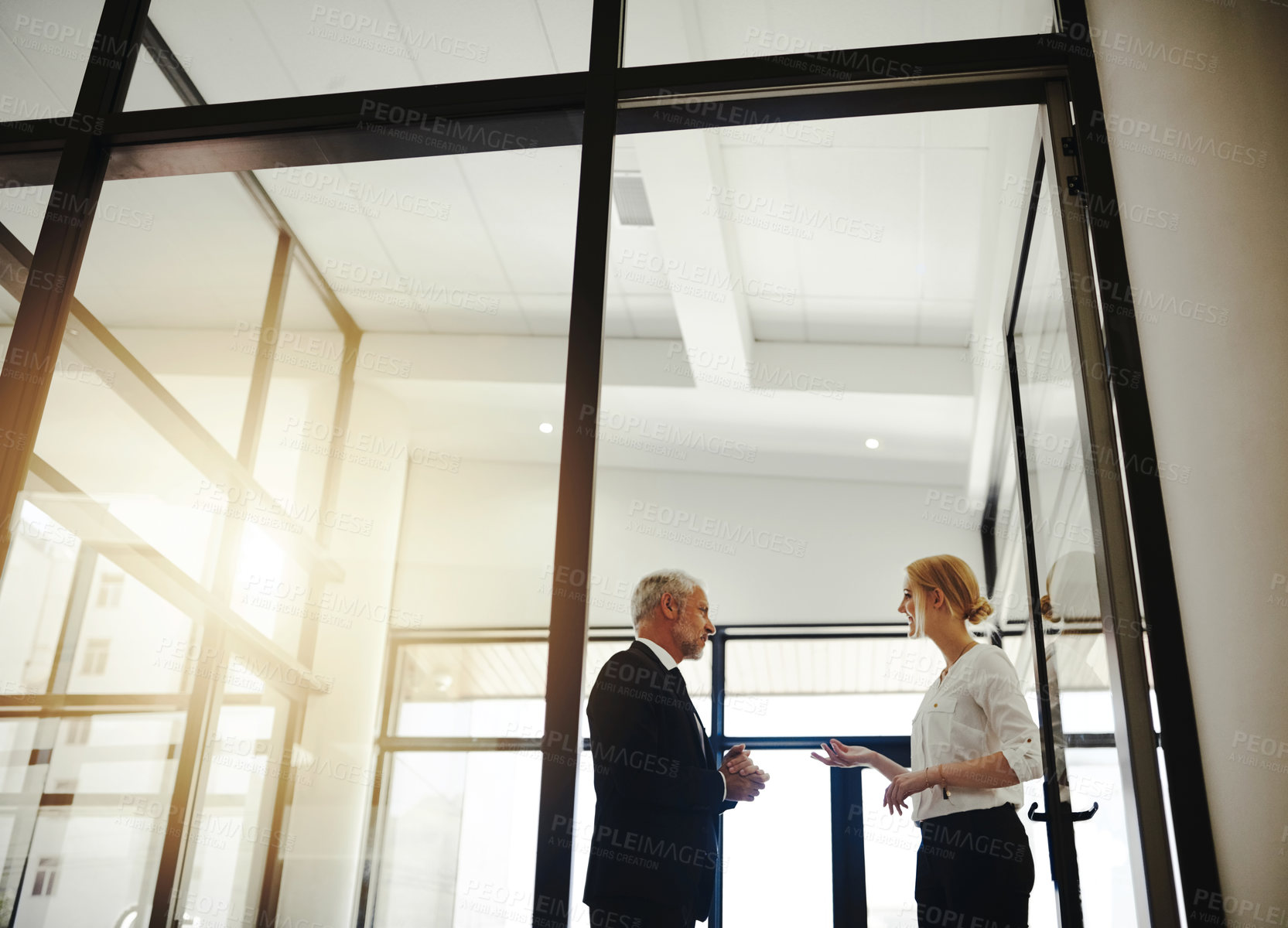 Buy stock photo CEO man, woman and secretary in office with conversation for schedule, agenda and low angle at company. Business people, talking and discussion with plan, reminder and assistant at insurance agency