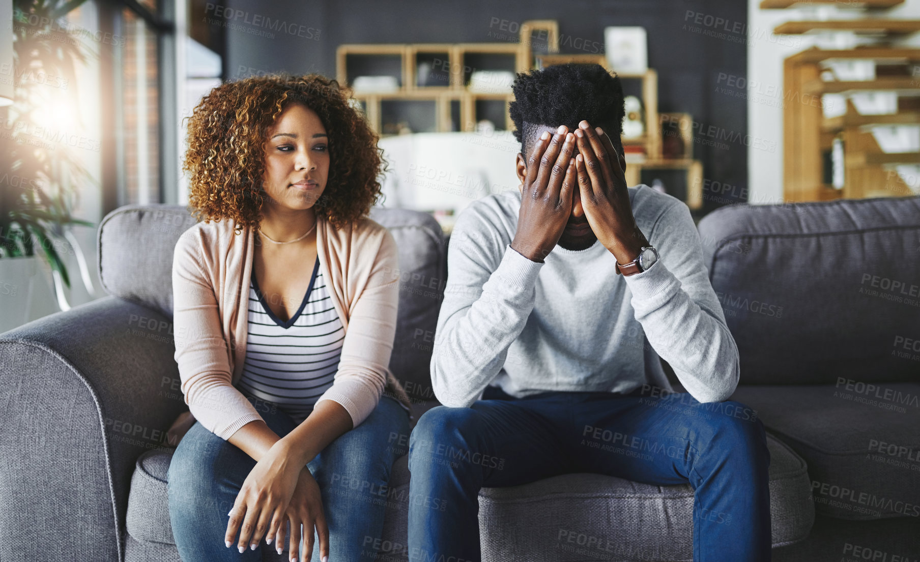 Buy stock photo Frustrated couple, fight and argument with disagreement for breakup, cheating affair or divorce on sofa at home. Upset, woman and man with conflict for bad seperation or toxic relationship at house