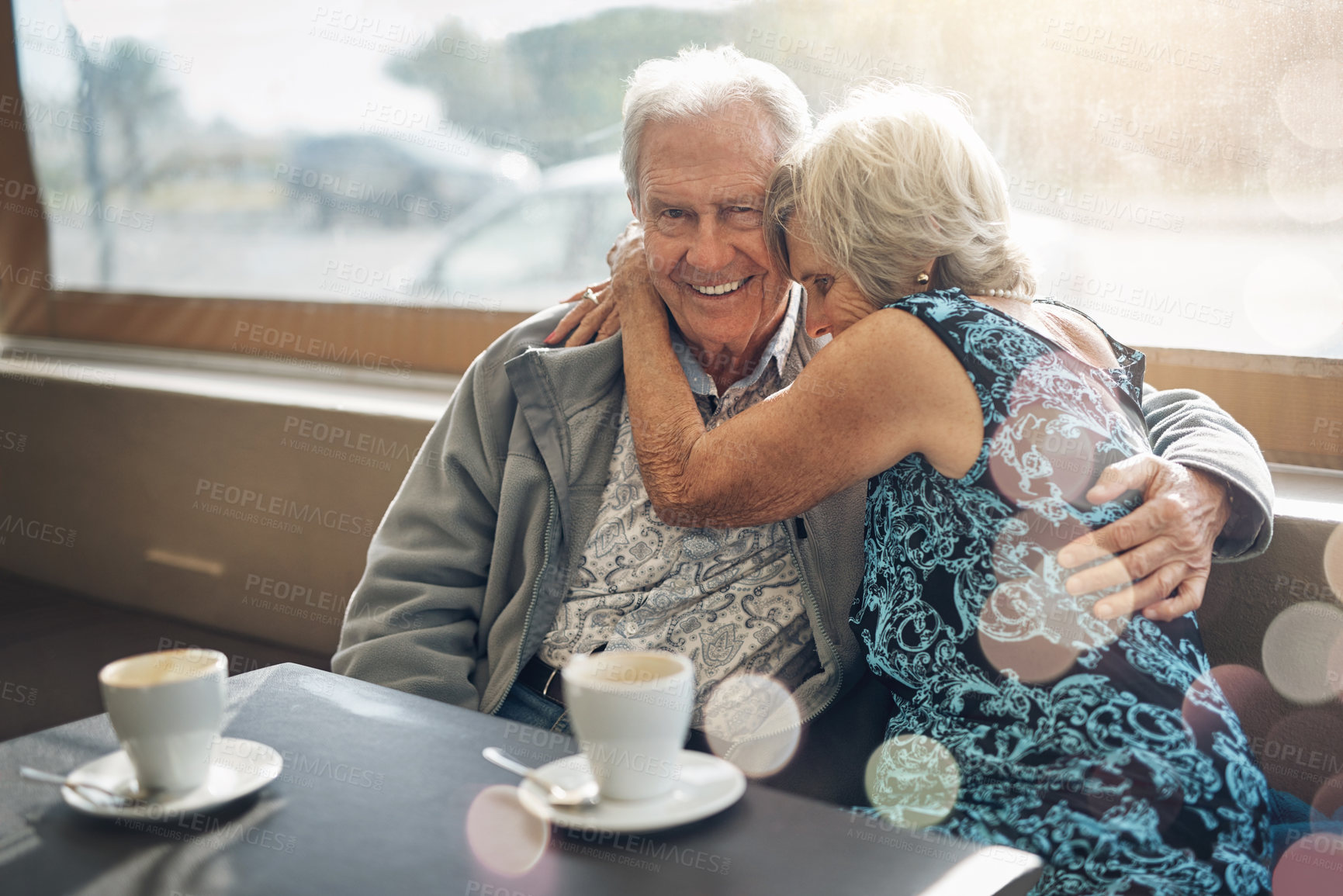Buy stock photo Coffee, hug and senior couple on date, portrait and conversation of past, love and retirement. Commitment, woman and man with embrace, happy and talking of marriage, together and break in weekend