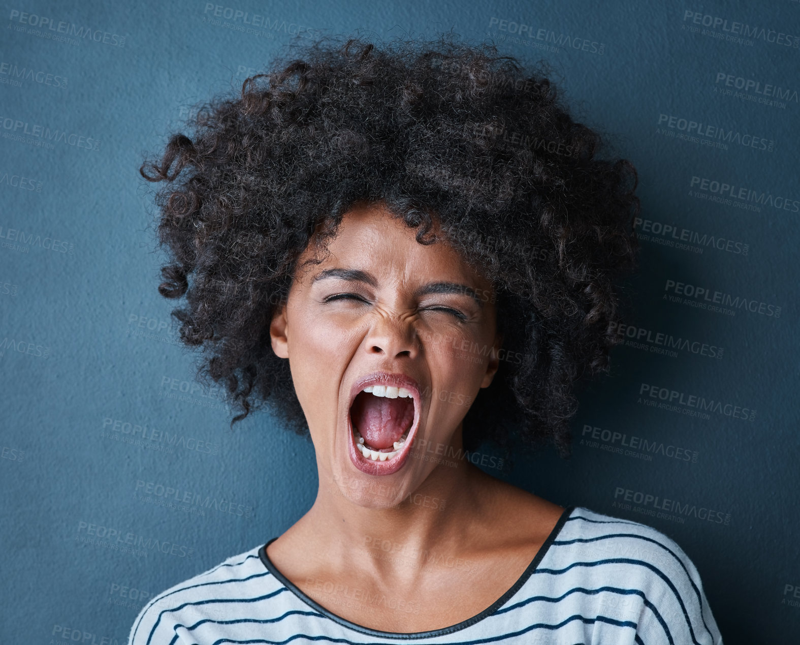 Buy stock photo Portrait, emoji and shout with facial expression in studio for anger, frustrated and attitude on blue background. Lady, stress and screaming black woman with face, rage and personality isolated