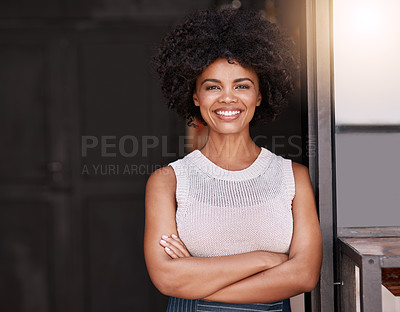 Buy stock photo Portrait of a confident young business owner posing in the doorway of her coffee shop