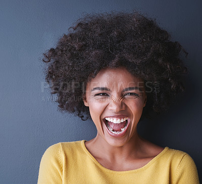 Buy stock photo Laughing, black woman and portrait in studio with happiness, comedy or freedom in mockup space. Happy, face and African lady smile, emoji or crazy reaction to joke or humor on grey background