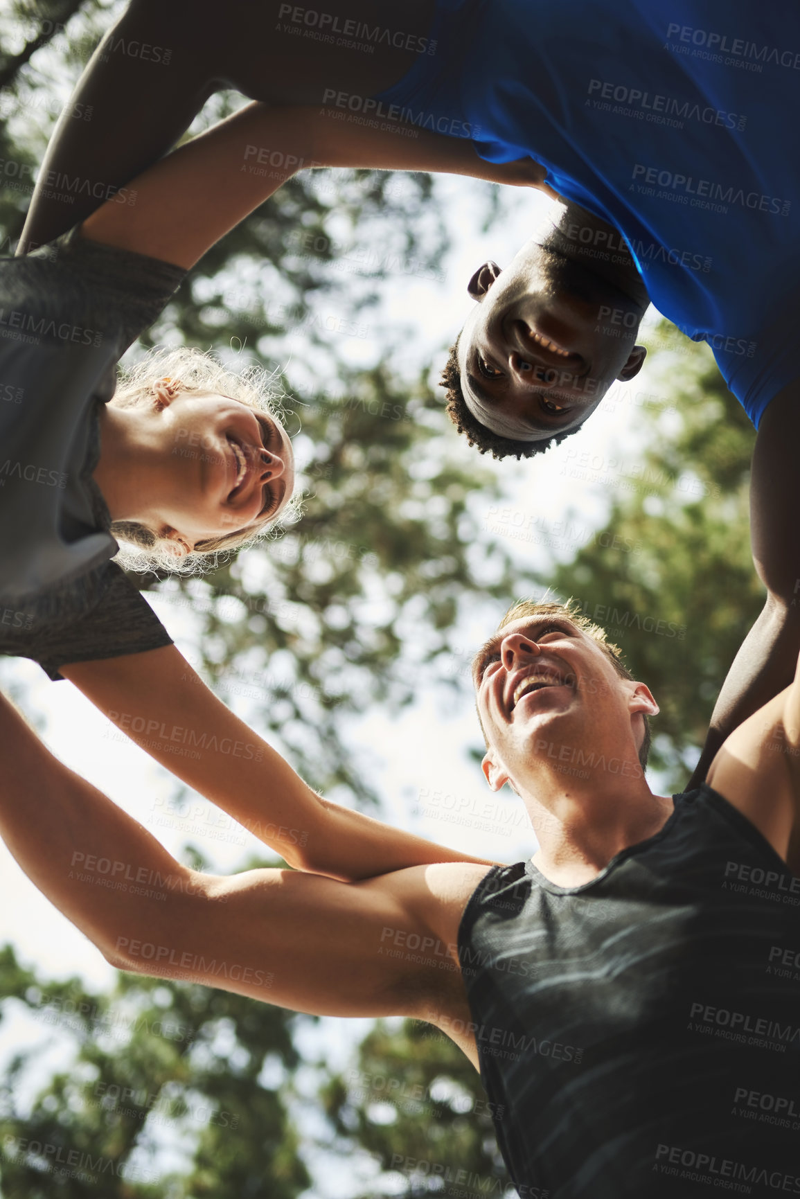 Buy stock photo Fitness, happy or friends in nature for huddle for running exercise, training or outdoor workout together. People, low angle and healthy runners in park for motivation, support or sports teamwork