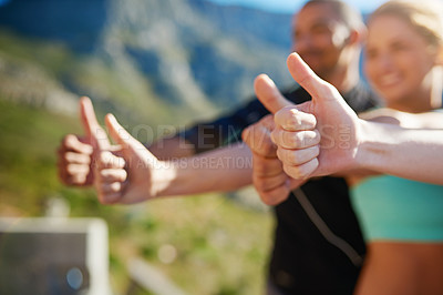 Buy stock photo Closeup shot of a fitness group showing thumbs up together