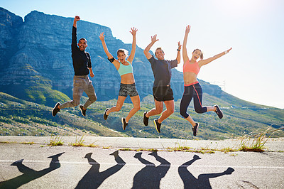 Buy stock photo Portrait of a fitness group celebrating after a workout outside