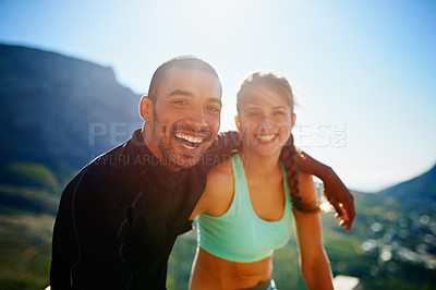 Buy stock photo Portrait of a sporty young couple out for a run together