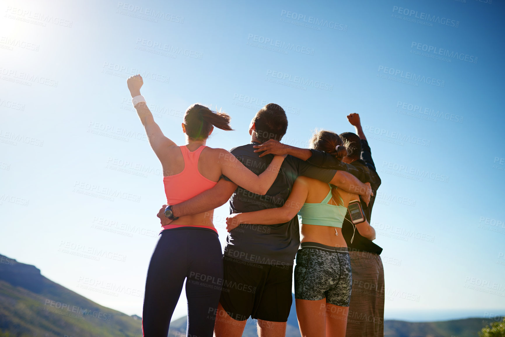 Buy stock photo People, hands up and group exercise for celebration with nature view, achievement or workout. Men, women and fist for mountain running or marathon training with athlete support, winning or victory