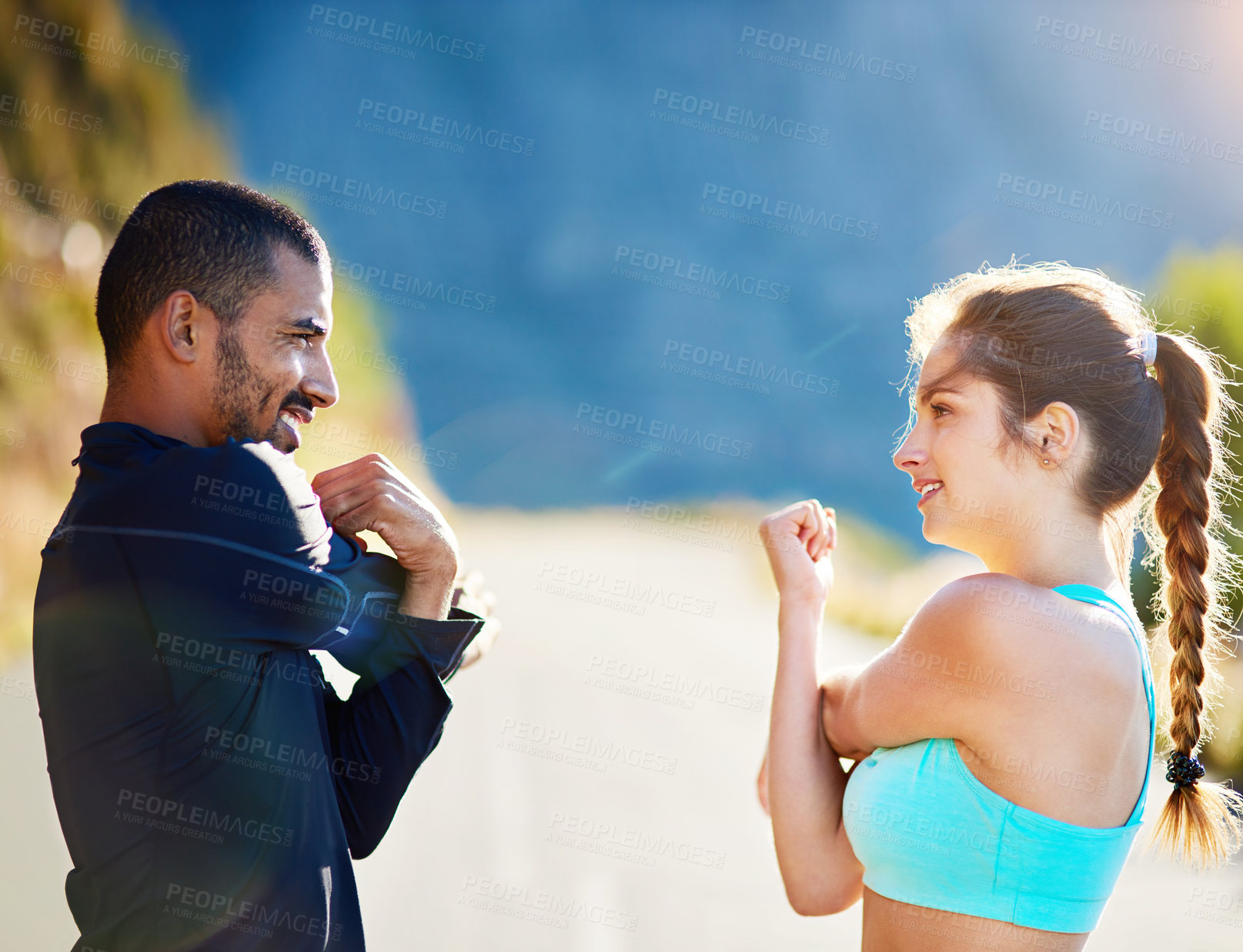 Buy stock photo Man, woman and outdoor stretching for fitness warm up or arm mobility on mountain path, coach or running. Personal trainer, client and nature workout for training support or friends, cardio or sport