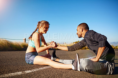 Buy stock photo Outdoor, exercise and couple with stretching on floor for sports, fitness or support in warm up. Nature, man and woman with hands together in flexibility for muscle strength, training or healthy body