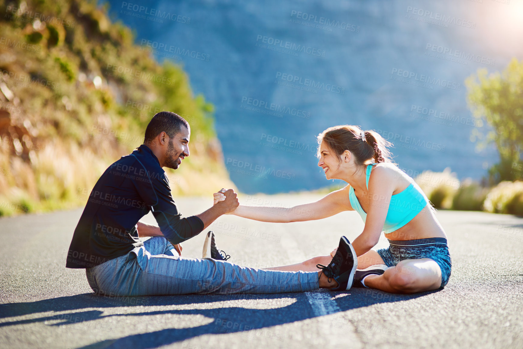 Buy stock photo Nature, fitness and couple with stretching on floor for sports, training and support in warm up. Happy, woman and man with hands together in flexibility for muscle strength, exercise and healthy body