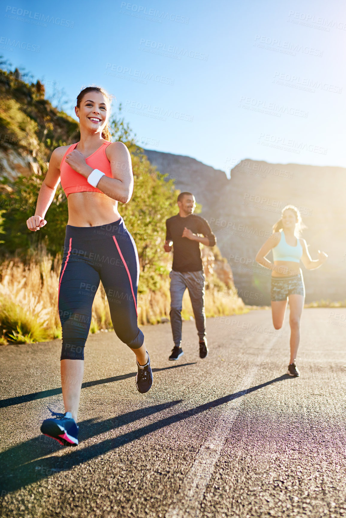 Buy stock photo Running, friends and people on road in morning for workout, exercise and marathon training outdoors. Sports, fitness and men and women for challenge, cardio and performance for health and wellness