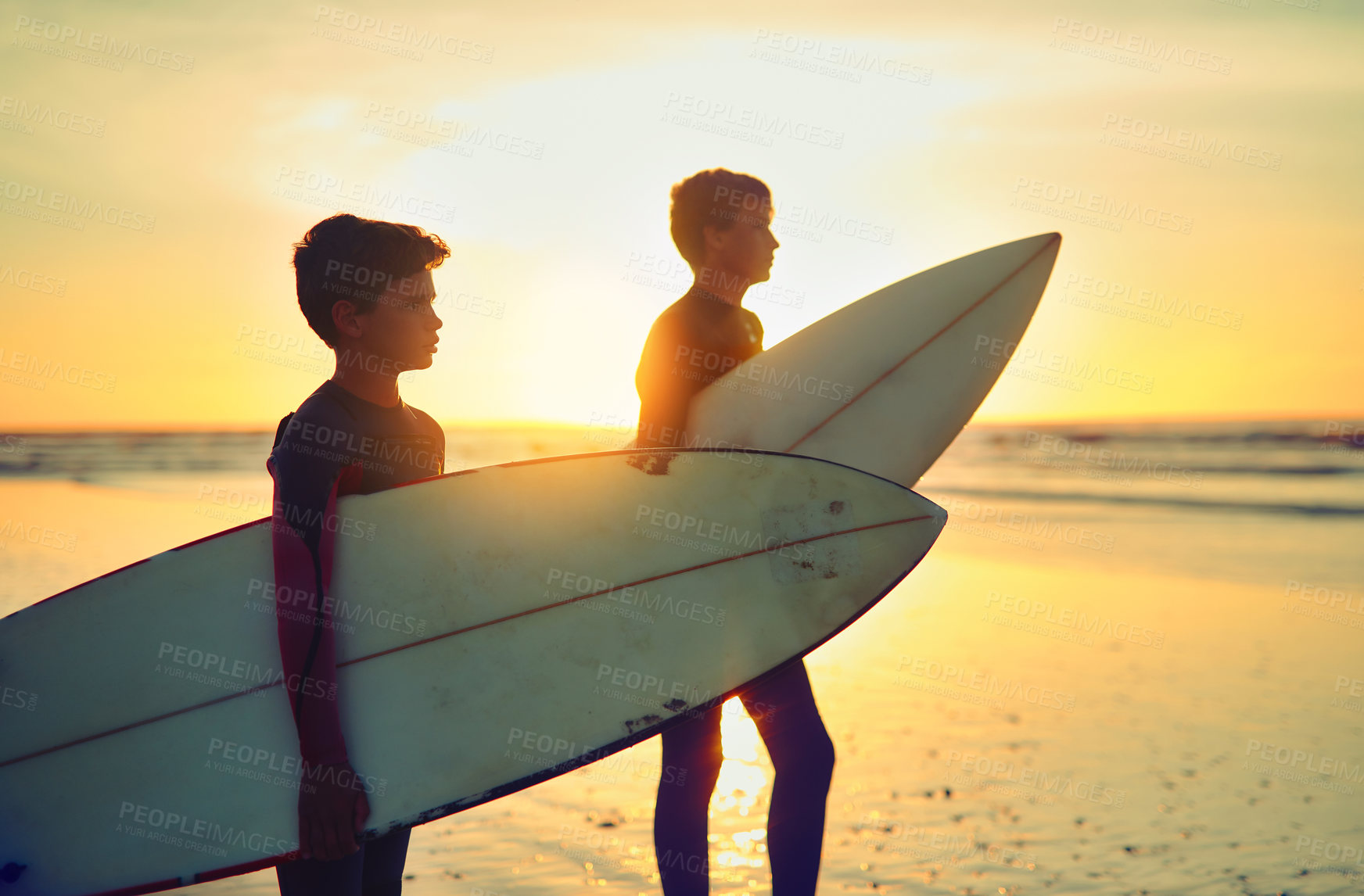 Buy stock photo Sunset, surf and kid on beach with board for adventure on vacation, holiday or sport in water. Child, surfer and thinking with peace on island with waves to watch in summer, tropical nature or relax