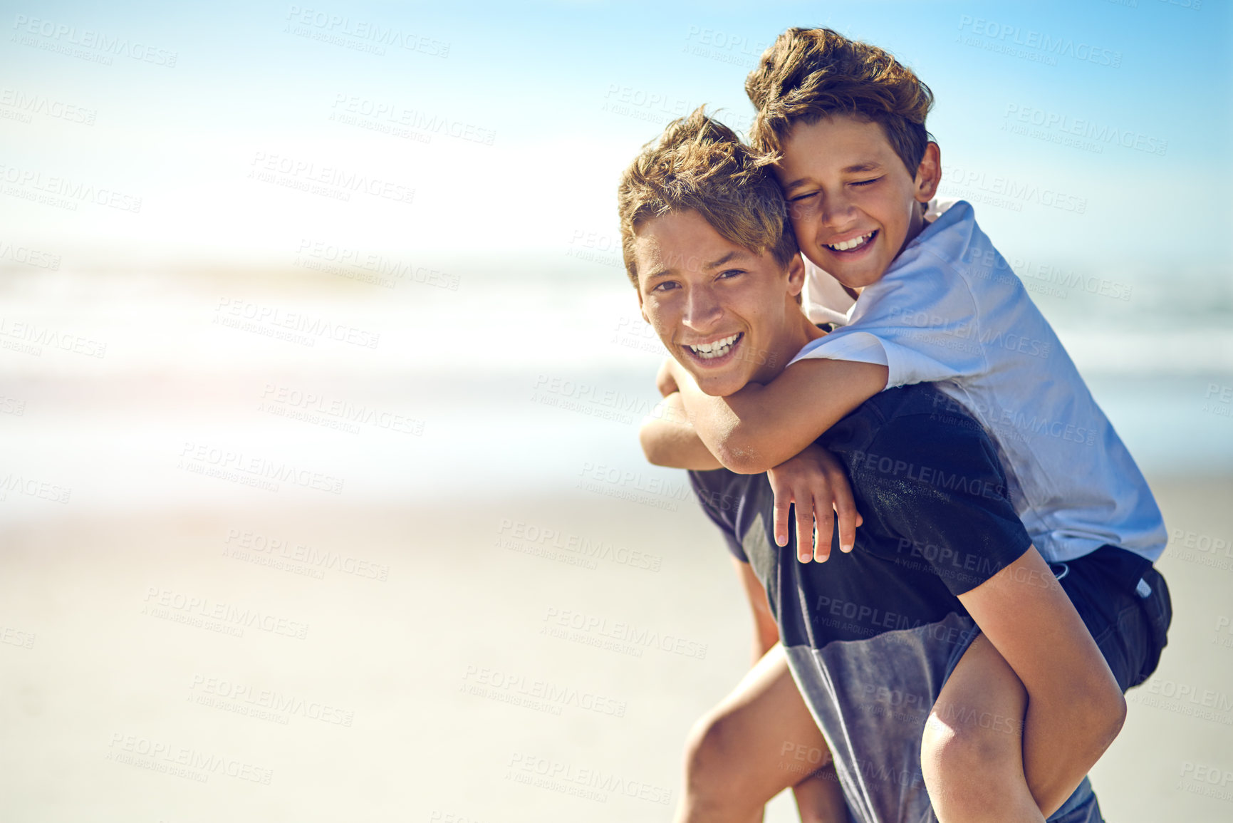 Buy stock photo Piggyback, portrait or boys at sea with smile or love for fun summer vacation, holiday or playing. Siblings, mockup space or happy kids outdoors in Spain at ocean or beach for travel or family memory