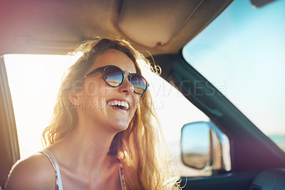 Buy stock photo Cropped shot of an attractive young woman on a roadtrip