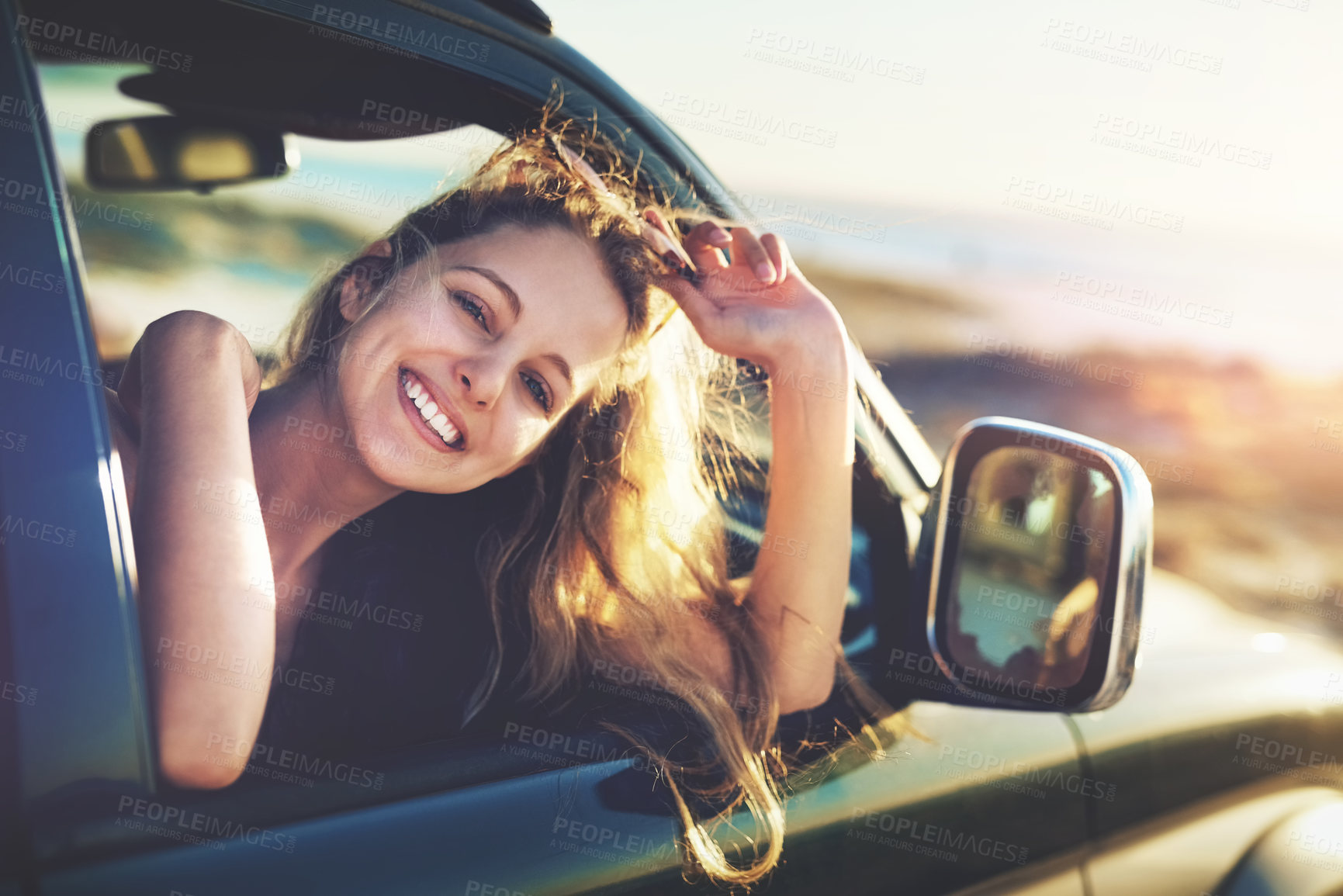 Buy stock photo Portrait, happy and woman with car in road trip in transport, vacation journey and travel adventure. Smile, female passenger and relax for freedom driving and holiday break in summer sunset.