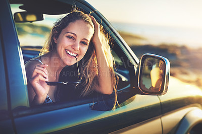 Buy stock photo Cropped portrait of an attractive young woman on a roadtrip