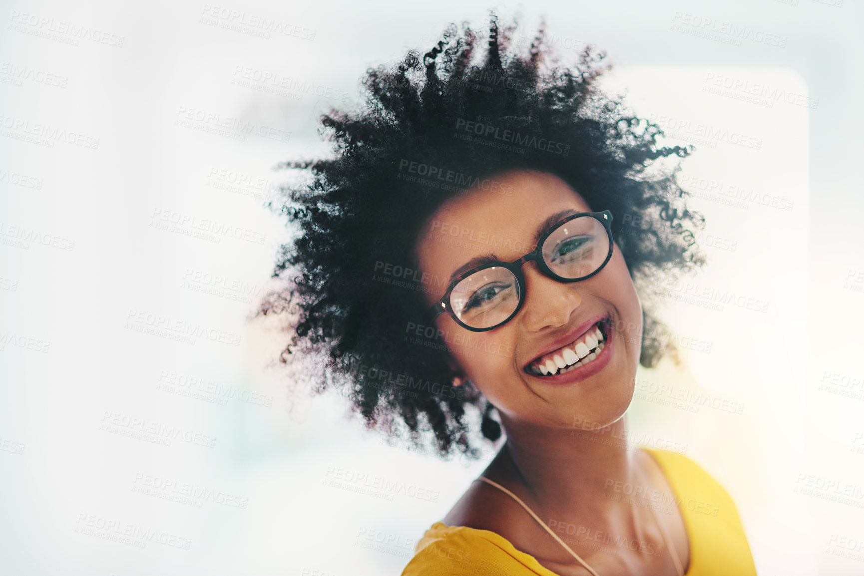 Buy stock photo Cropped portrait of an attractive young woman chilling at home on the weekend