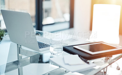 Buy stock photo Closeup shot of digital devices on a desk in an office