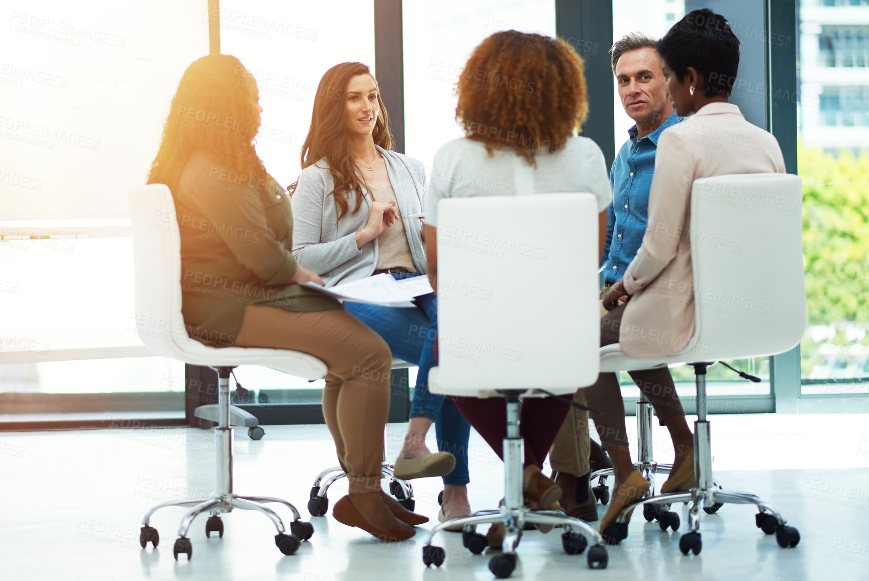 Buy stock photo Business, meeting and people in discussion with documents for article planning, publication briefing or creative ideas. Flare, journalist collaboration or feedback in circle for story draft deadline