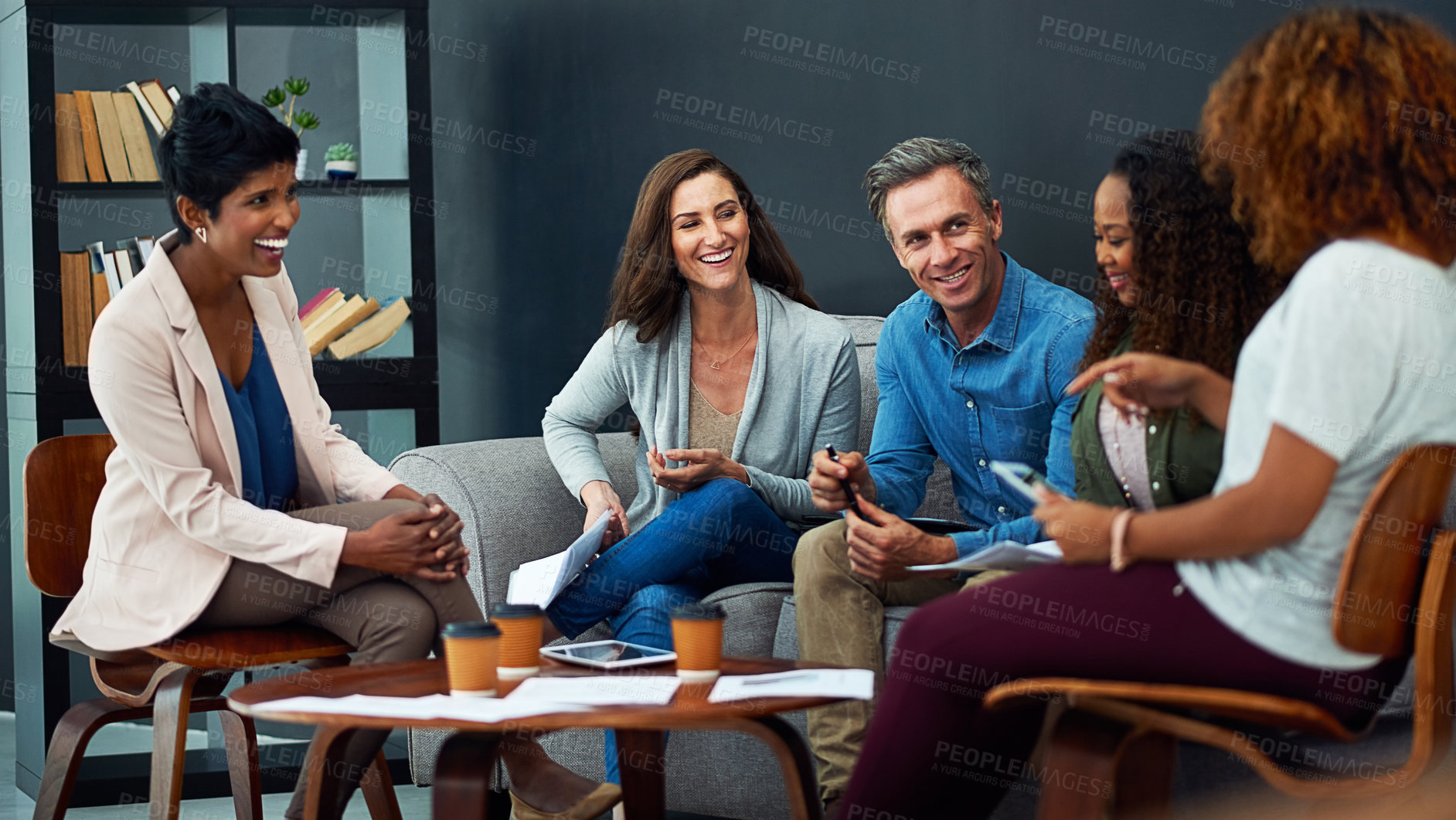 Buy stock photo Shot of a creative team meeting in the office