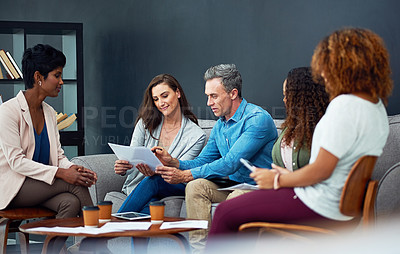 Buy stock photo Shot of a creative team meeting in the office