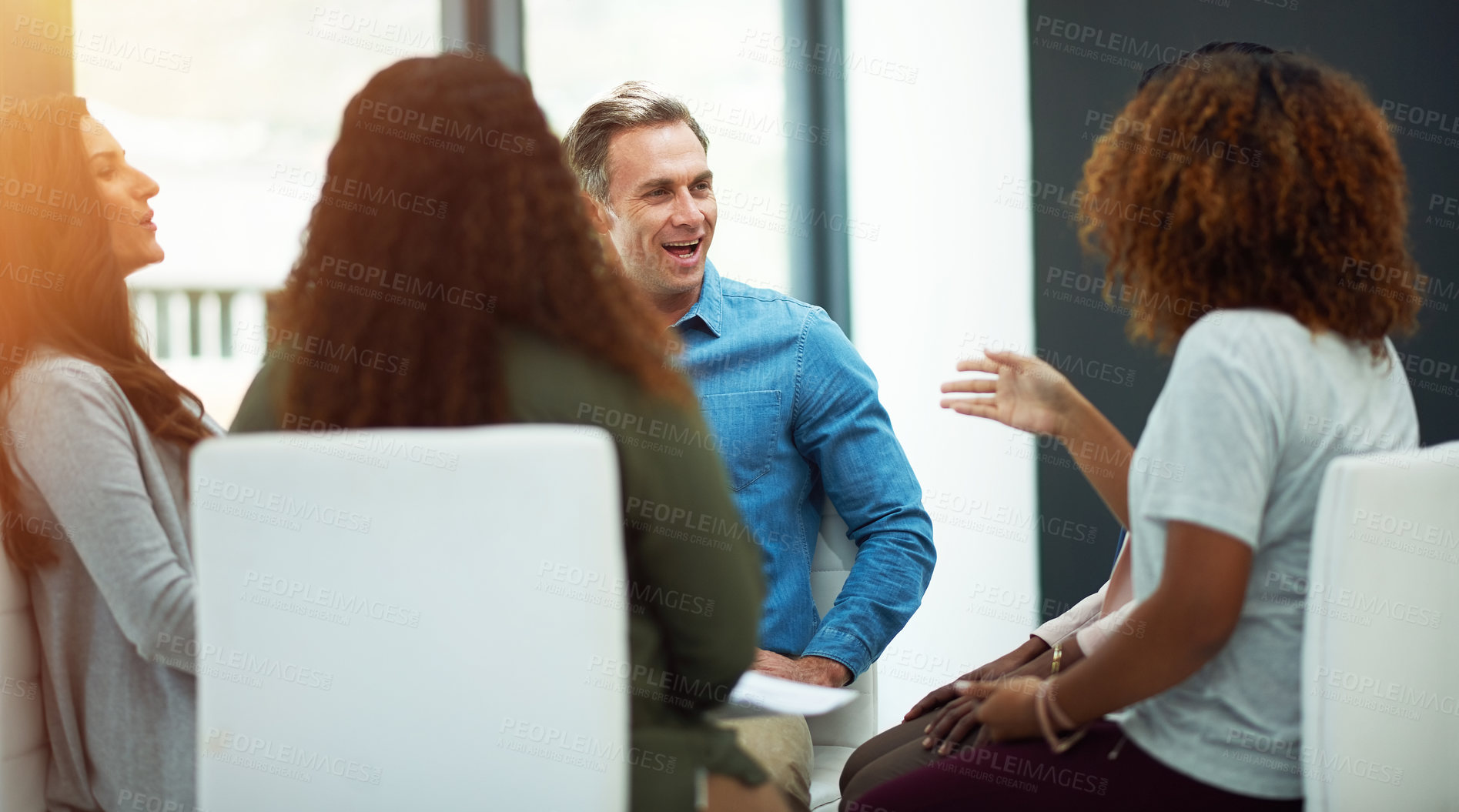 Buy stock photo Meeting, teamwork and business people with talking in office, pitch and writers for publication. Collaboration, journalists and editor in newsroom for article information, discussion or review report