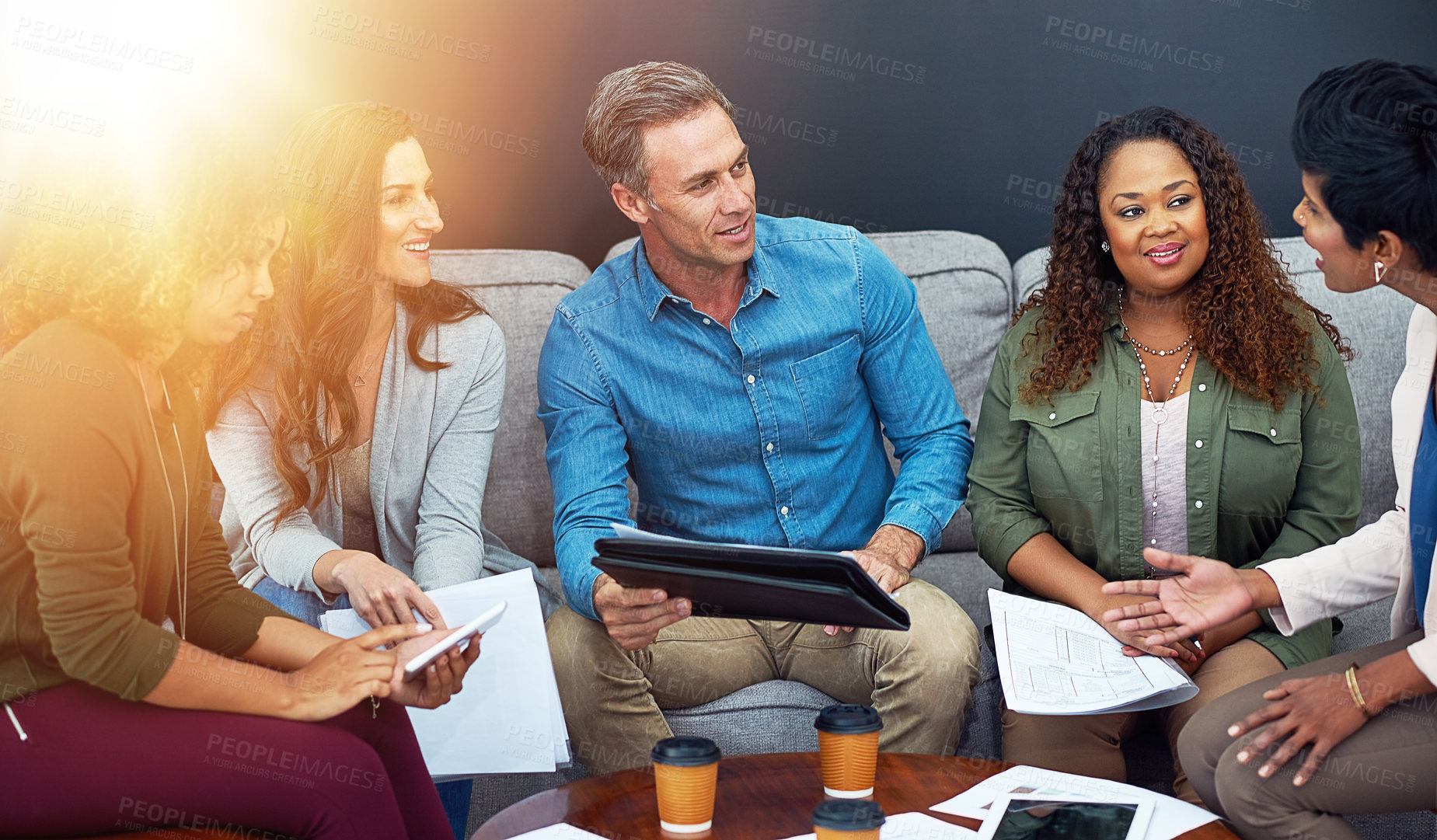 Buy stock photo Shot of a creative team meeting in the office