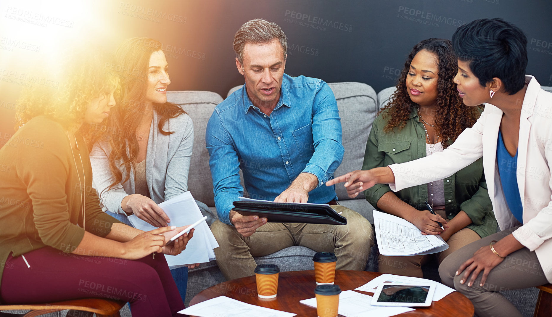 Buy stock photo Shot of a creative team meeting in the office