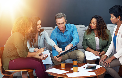 Buy stock photo Shot of a creative team meeting in the office