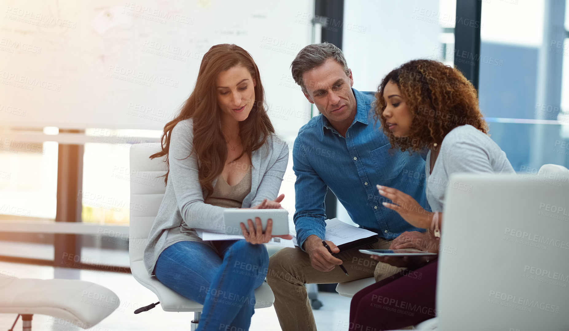 Buy stock photo Creative, people and meeting with tablet in office for brainstorming, research and publishing report. Staff, journalist and talking for multimedia feedback, planning and news update for project ideas