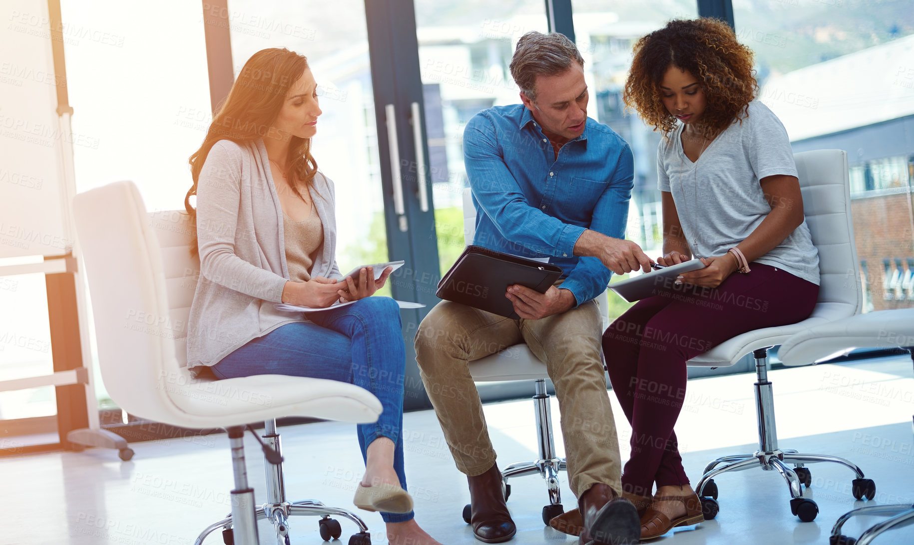 Buy stock photo Pointing, creative and team in office with tablet, communication and planning for digital campaign. Strategy, collaboration and people in meeting with tech, ideas and discussion in marketing agency.