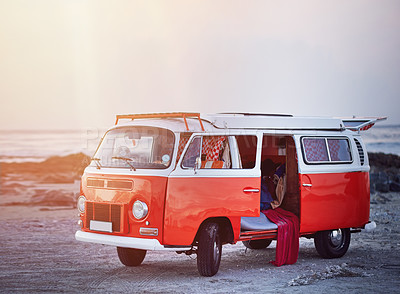 Buy stock photo Full length shot of an empty van parked at the beach during a roadtrip