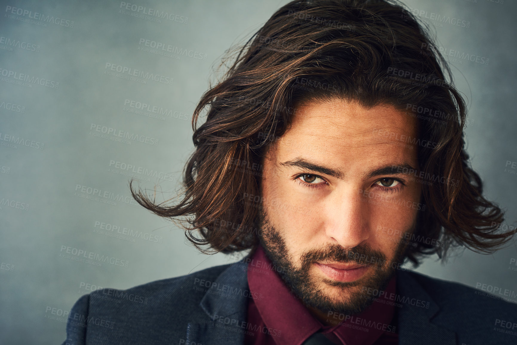 Buy stock photo Studio portrait of a stylishly dressed handsome young man