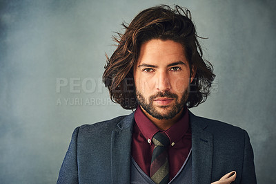 Buy stock photo Studio portrait of a stylishly dressed handsome young man