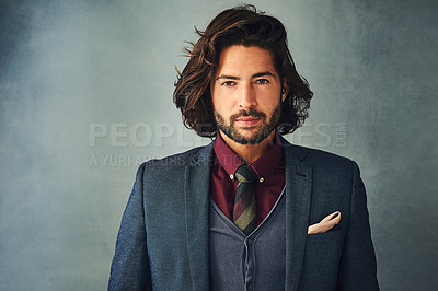 Buy stock photo Studio portrait of a stylishly dressed handsome young man