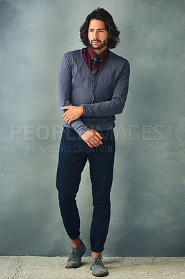 Buy stock photo Studio shot of a stylishly dressed handsome young man