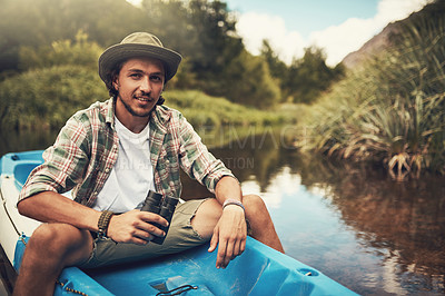 Buy stock photo Portrait of a young man going for a canoe ride on the lake
