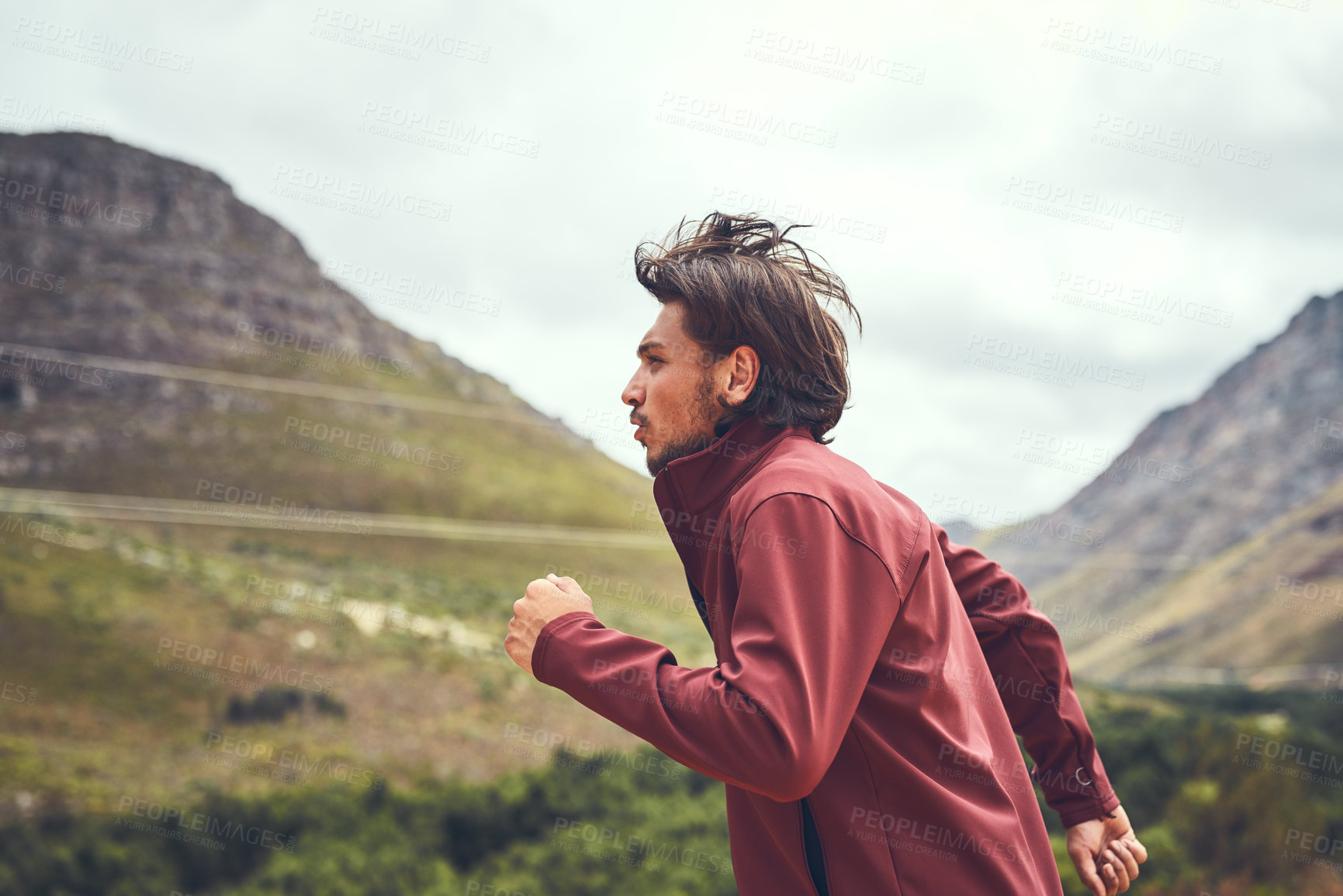 Buy stock photo Man, outdoor and running on mountain for fitness, endurance training and personal challenge for wellness. Male person, side view and space in nature for trail adventure, hiking workout and exercise.