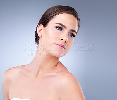 Buy stock photo Cosmetic, skincare and woman in studio with natural, health and facial treatment for glow result. Wellness, beauty and female person from Germany with face dermatology routine by gray background.