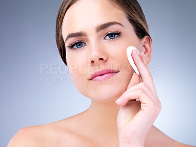 Buy stock photo Woman, studio and skincare with cotton pad, beauty portrait and dermatology health by backdrop. Model, skin wellness and cosmetic clean for glow, facial or natural exfoliate by grey studio background