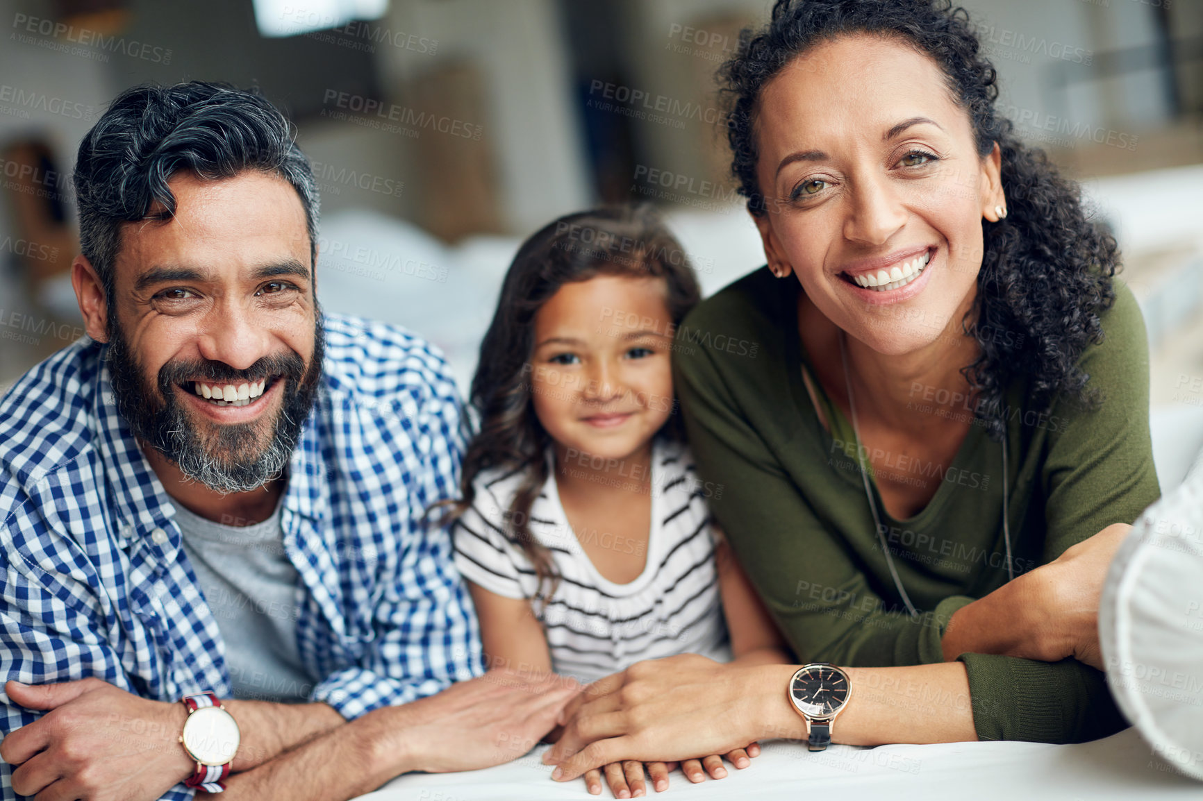 Buy stock photo Portrait of a happy family bonding together at home