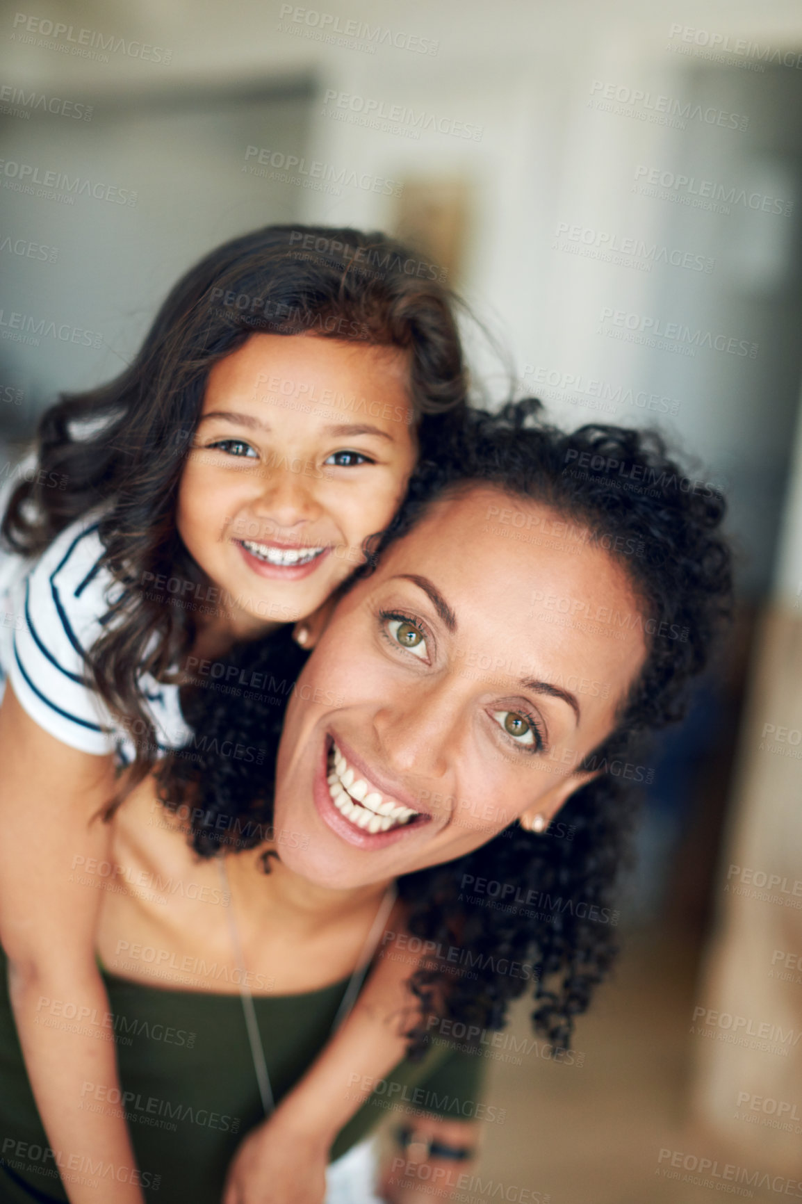 Buy stock photo Portrait of a mother and daughter bonding together at home