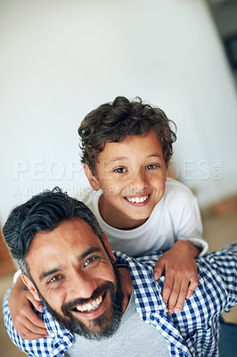 Buy stock photo Portrait of a father and son bonding together at home