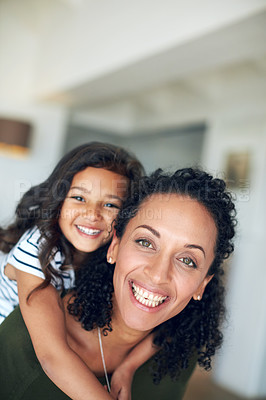 Buy stock photo Portrait of a mother and daughter bonding together at home