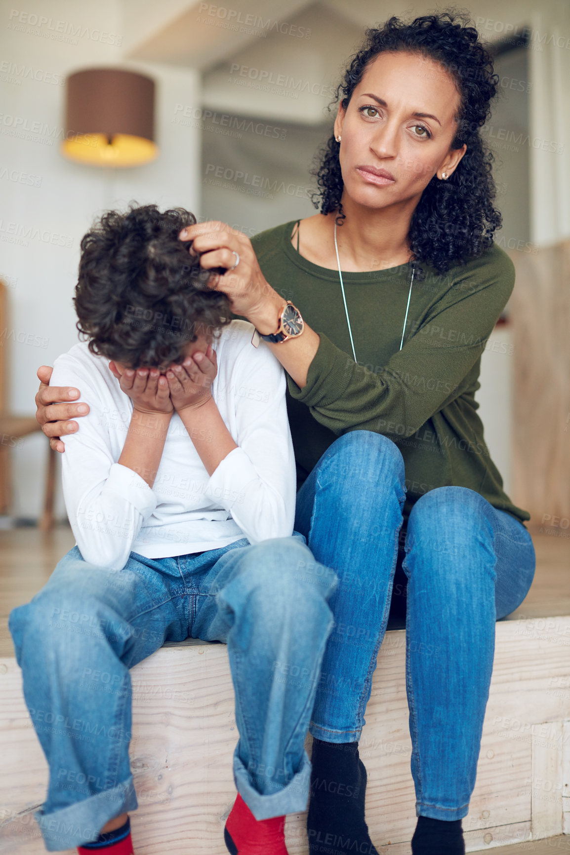 Buy stock photo Portrait of a mother comforting her little son at home